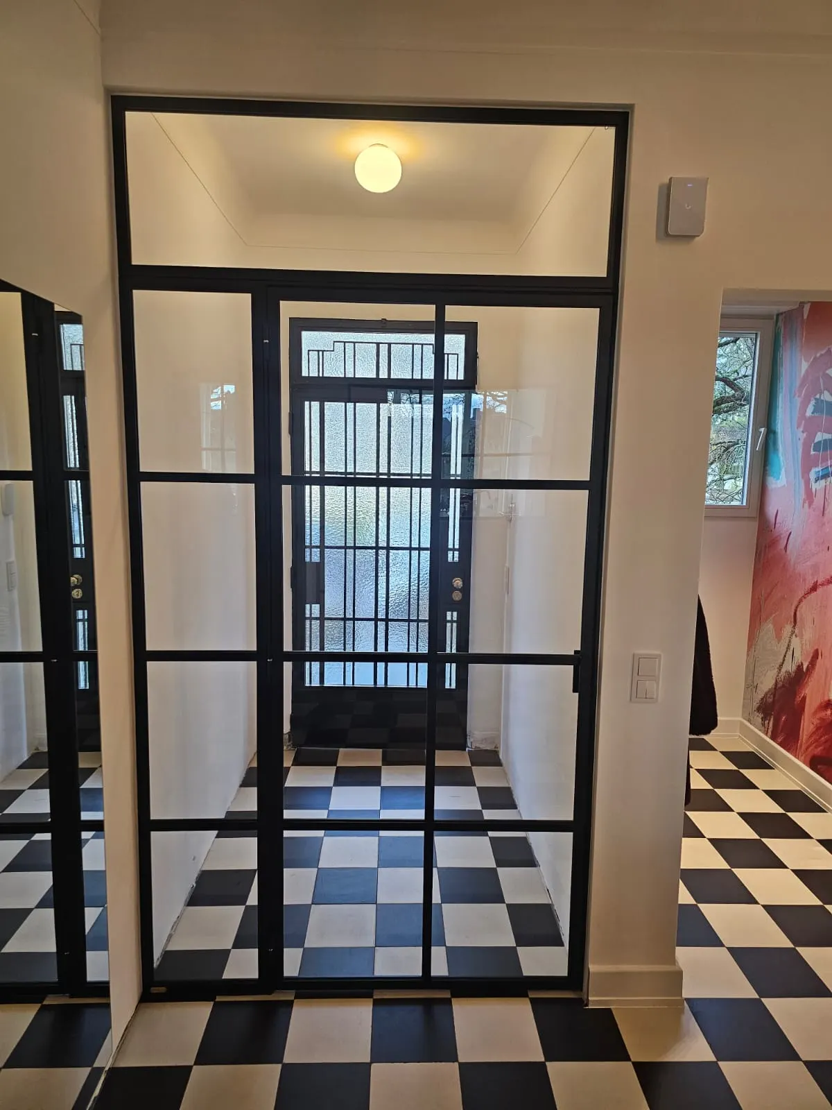 Verrière d'atelier à l'entrée sur sol en damier — verrière Luxembourg — Vitralux Bradtke